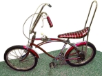 
Thumbnail image of a red 1970s banana seat bicycle